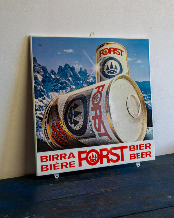 Insegna pubblicitaria Birra Forst con lattine – 1970