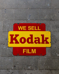 Insegna pubblicitaria vintage Kodak “We Sell Kodak Film” – USA, 1960