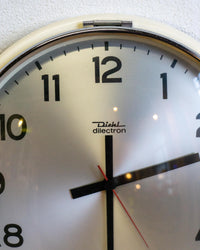Orologio da parete Diehl in vetro e metallo – anni ’60