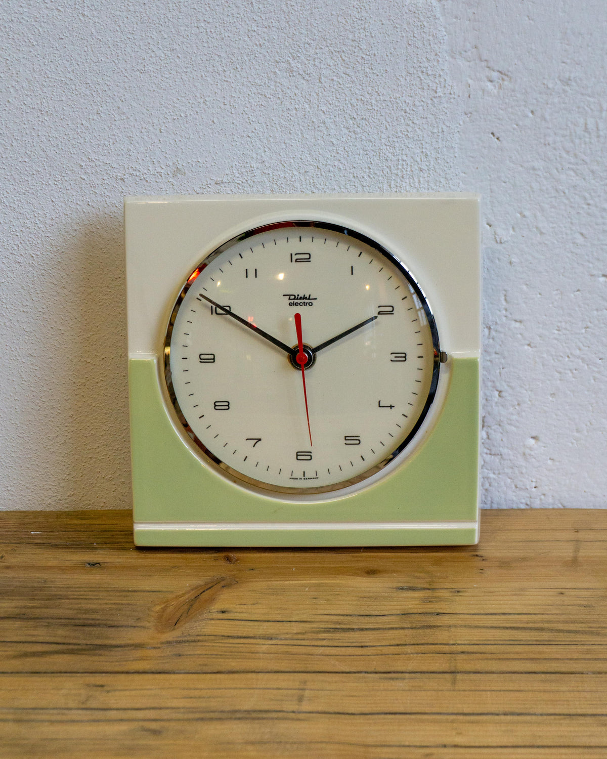 Orologio da parete Diehl Electro in ceramica verde e panna con vetro – anni ’60