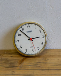 Orologio da parete Electric 7 Rubis in metallo panna e cromato – anni ’60