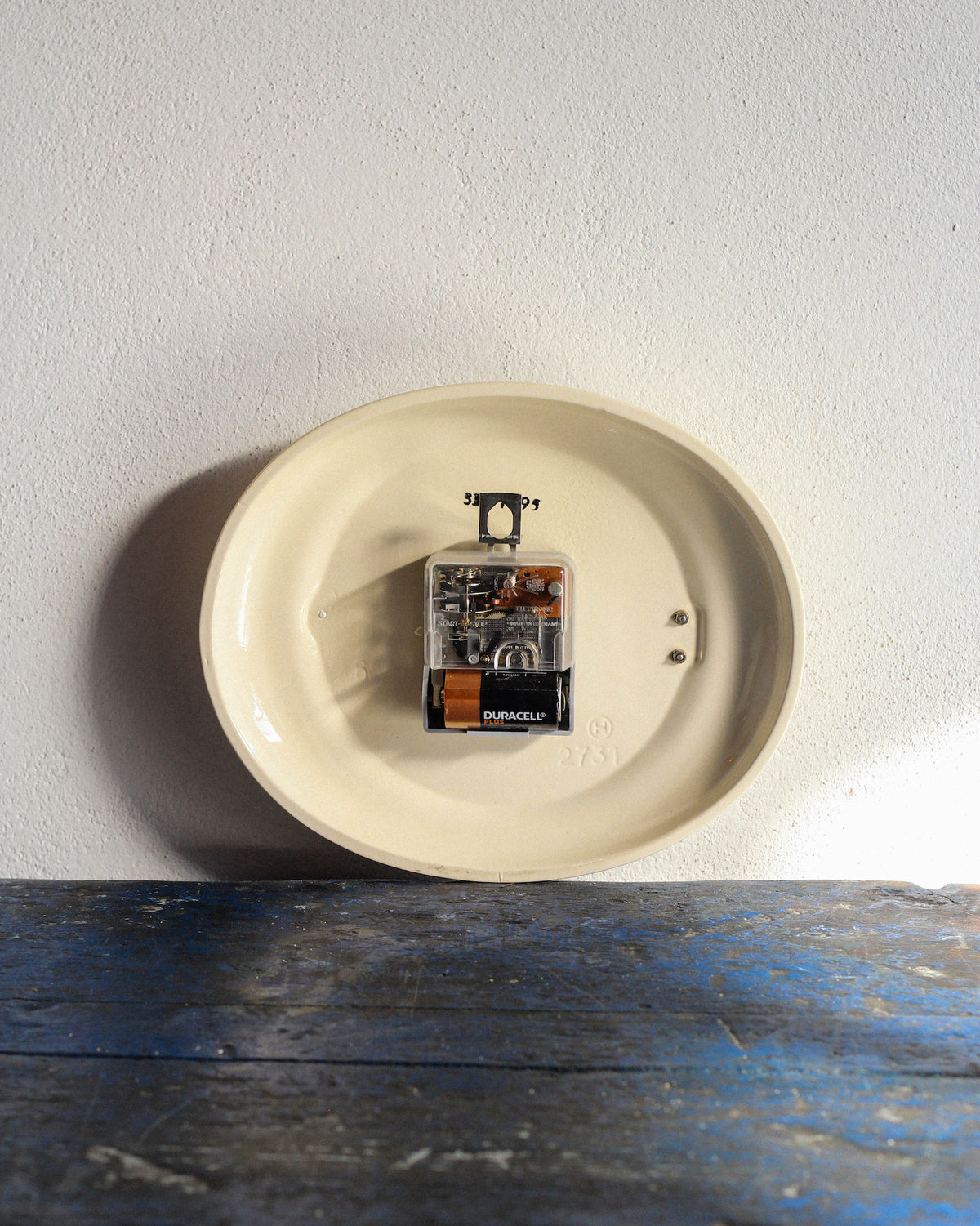 Orologio da parete Junghans ovale in ceramica