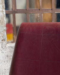 Poltrona da ufficio vintage bordeaux in semilpelle con rotelle – 1970