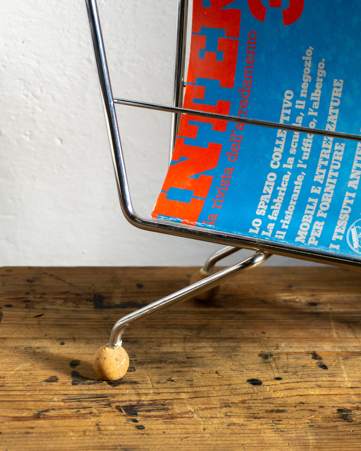 Portariviste cromato con piedini in legno – anni ’70