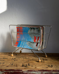 Portariviste cromato con piedini in legno – anni ’70