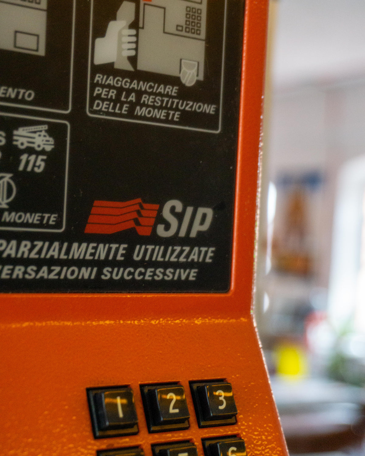 Telefono pubblico SIP Rotor arancio e grigio - 1980