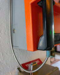 Telefono pubblico SIP Rotor arancio e grigio - 1980